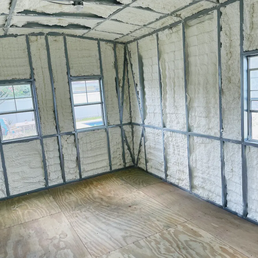 Closed-cell spray foam insulation applied to wall cavities in a residential project in Joppatowne